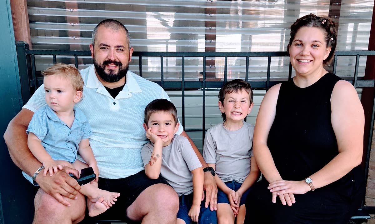 Phil and Mackenzie Windham with their three boys